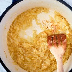 onions being caramelized in a large saucepan