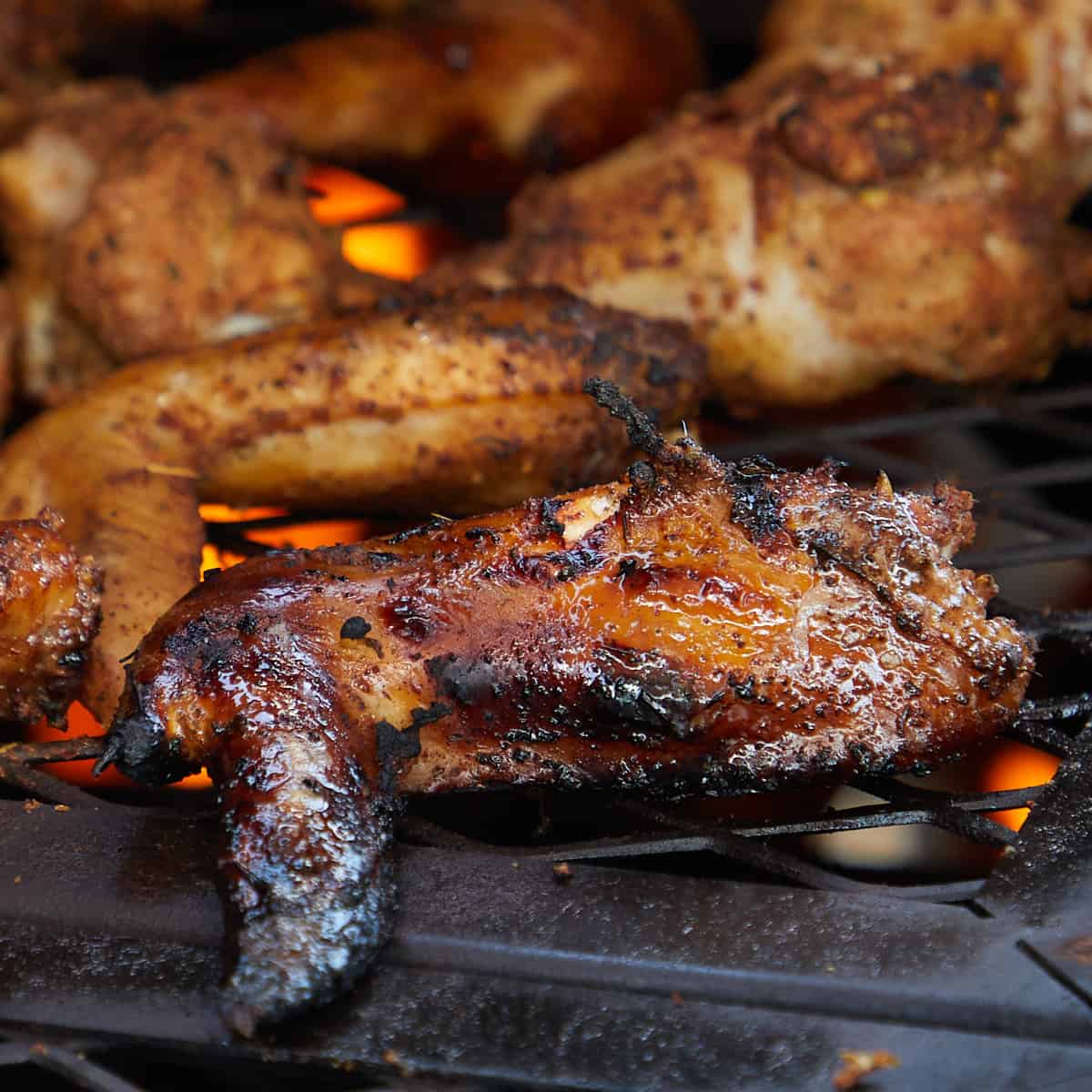 wings on a grill being cooked