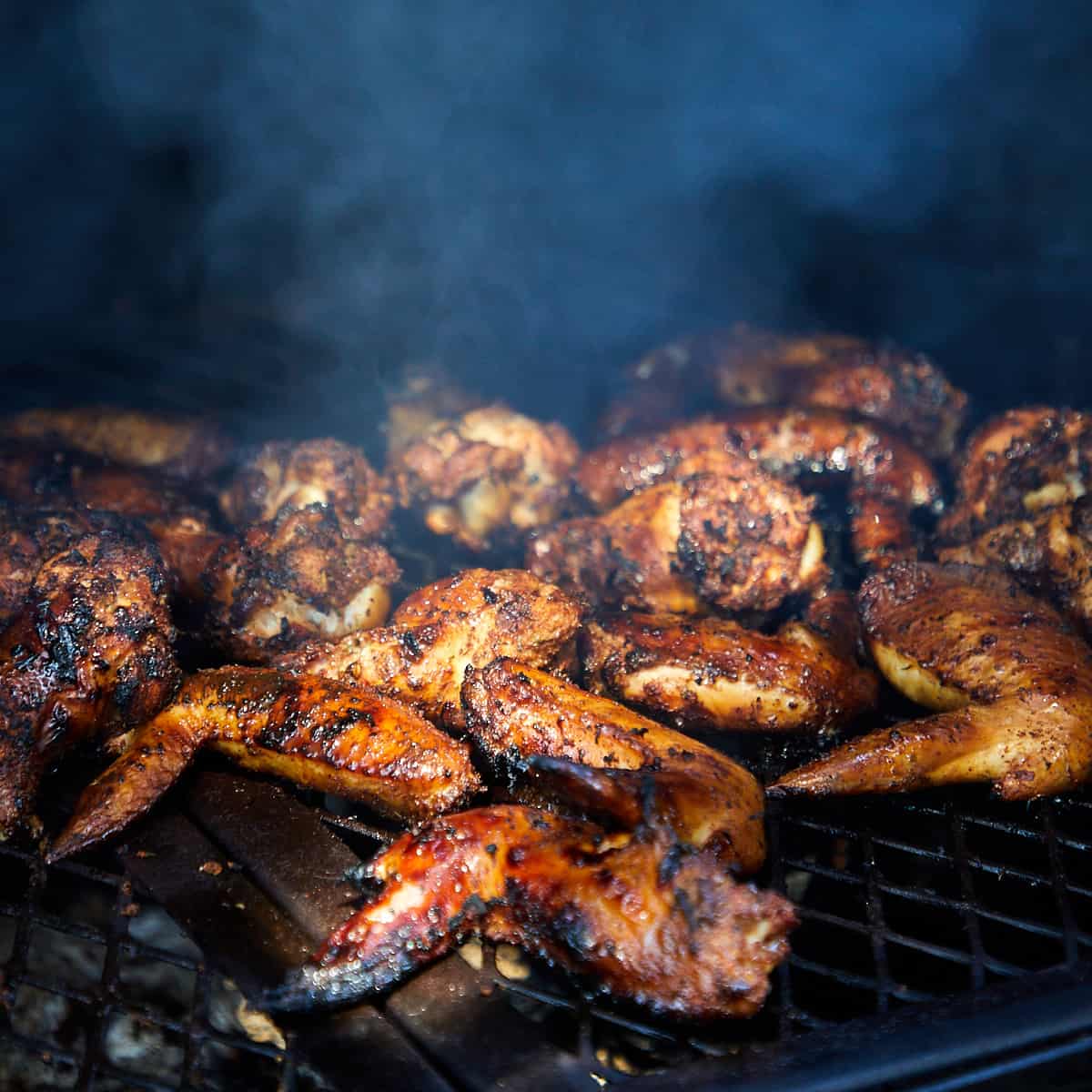wings on a grill being cooked