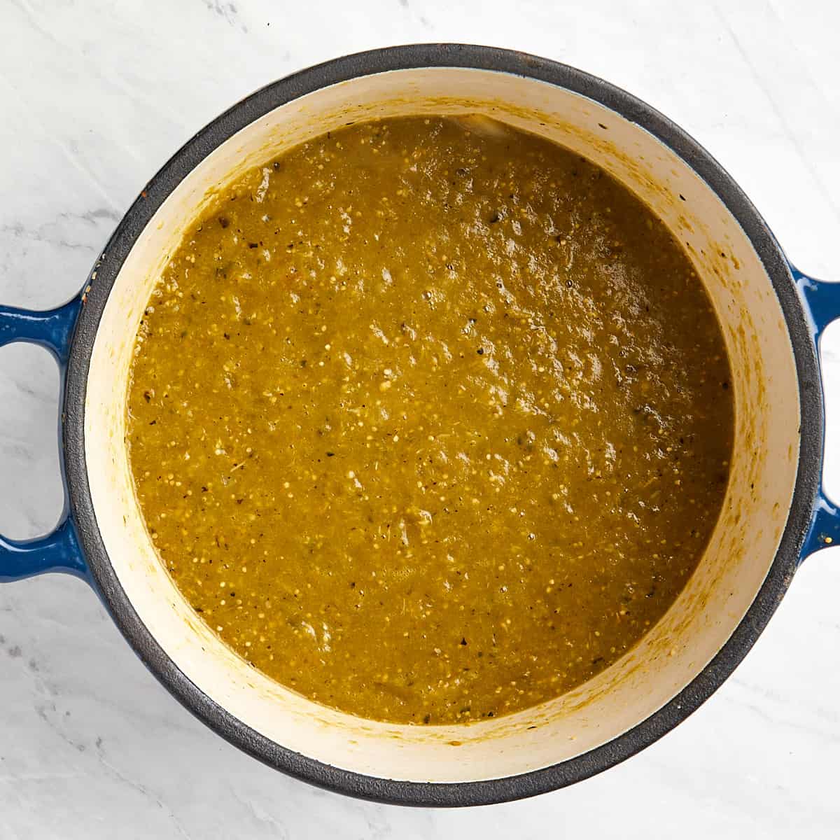 cooked tomatillo sauce in a dutch oven