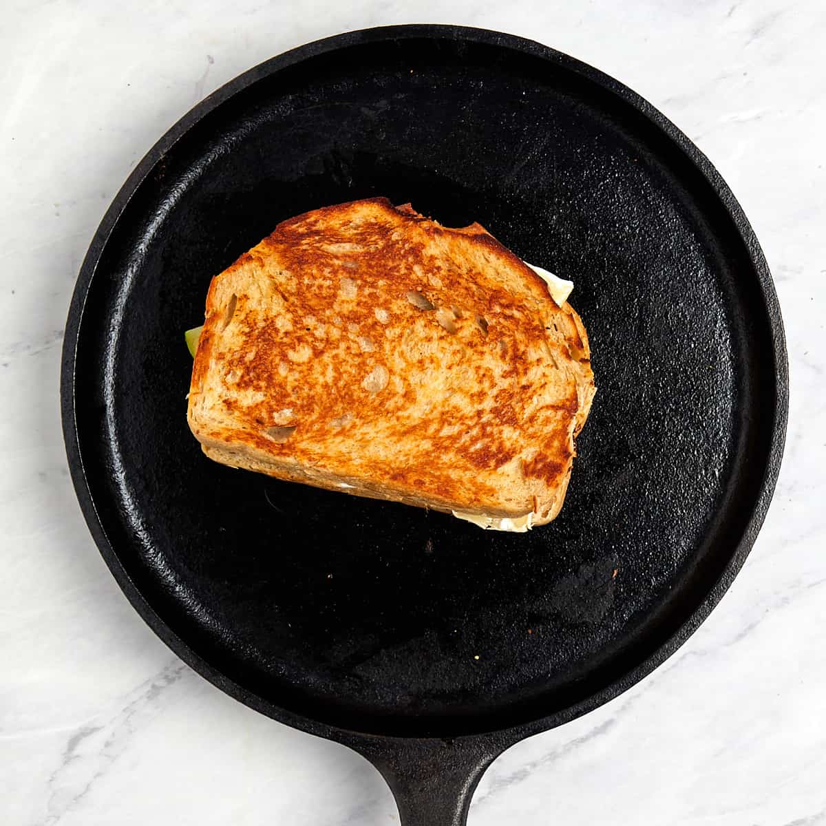grilled cheese on a cast iron griddle