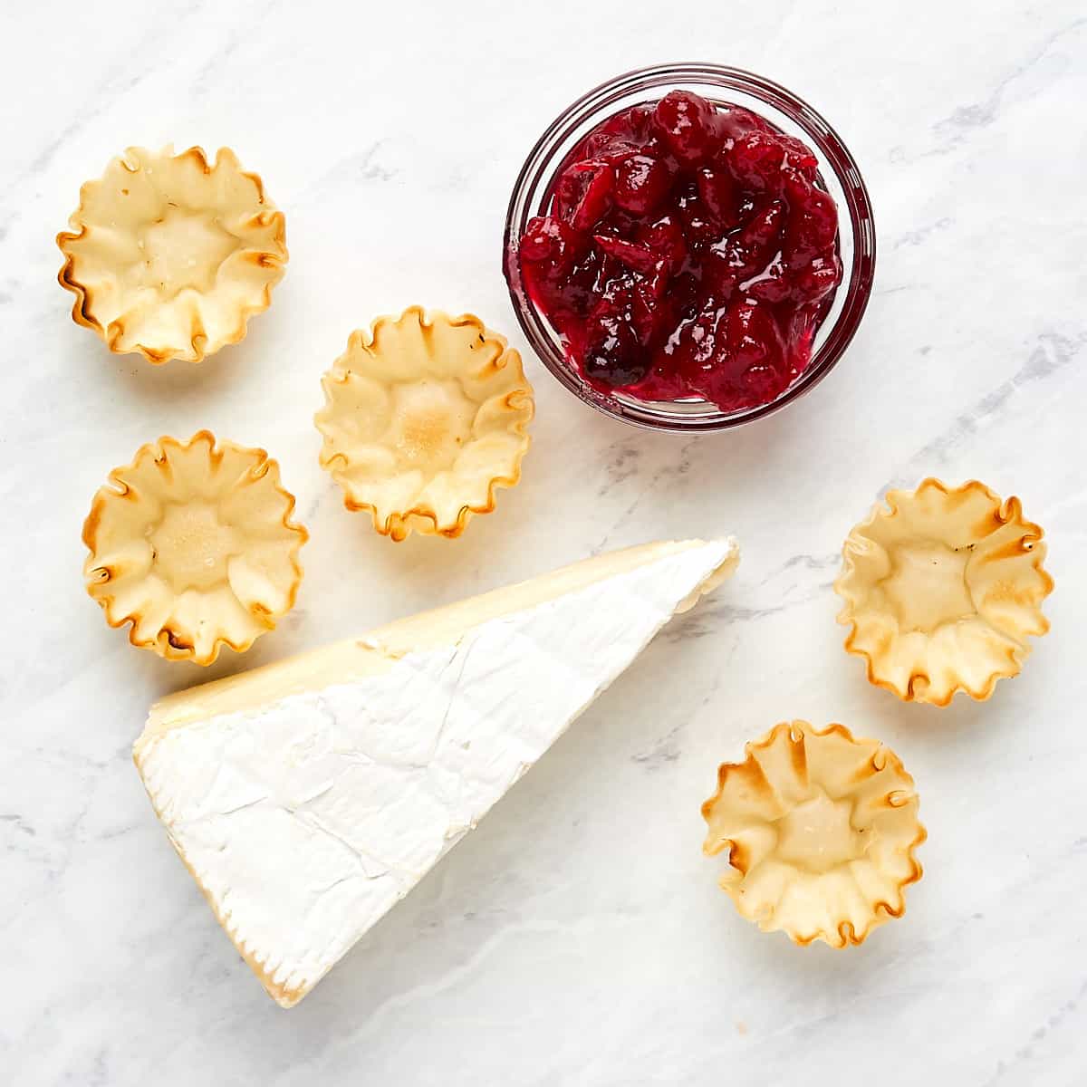 ingredients - brie, phyllo cups, and cranberry suace