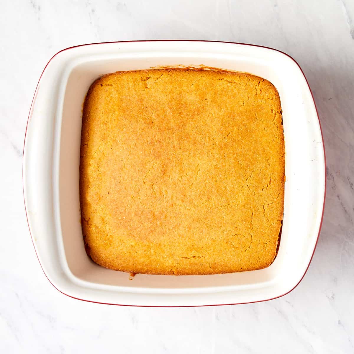 cooked cornbread in a baking pan