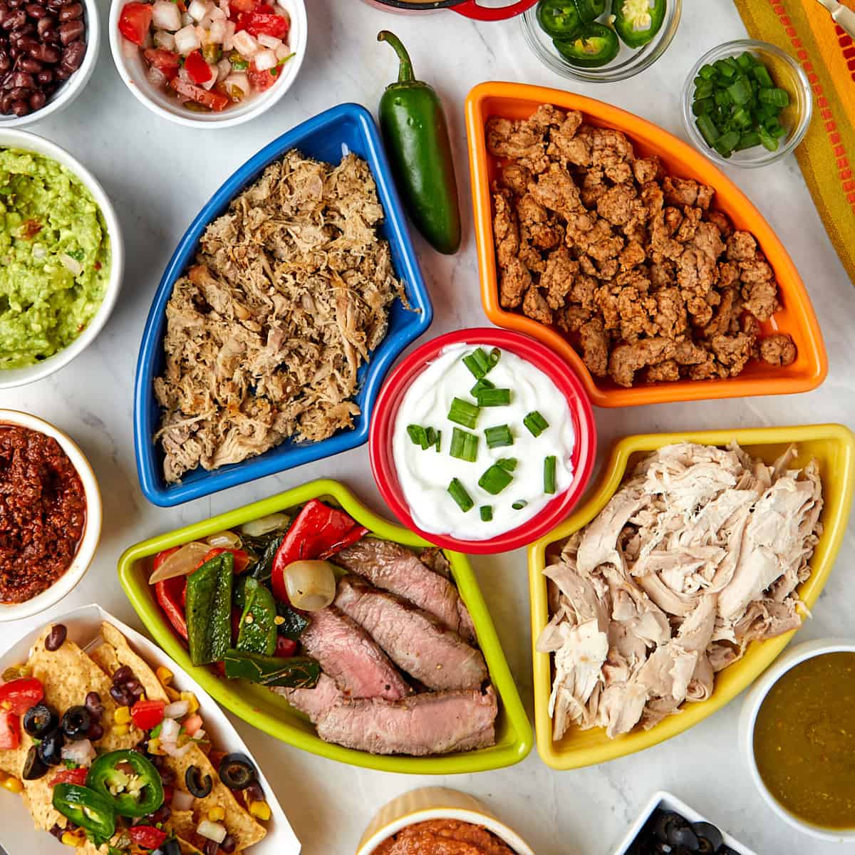 nacho bar toppings in serving containers