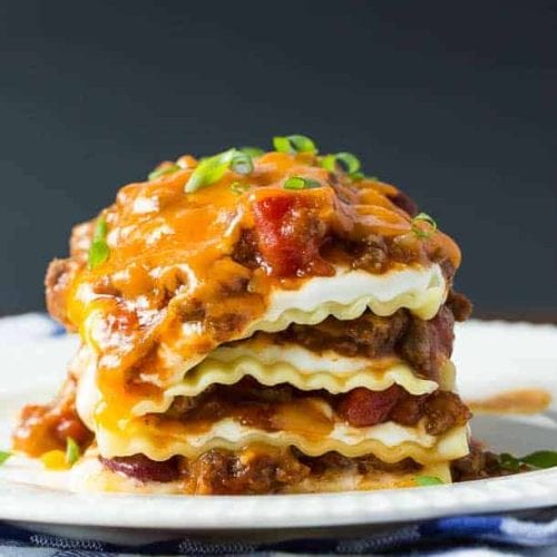 a slice of chili lasagna on a plate.