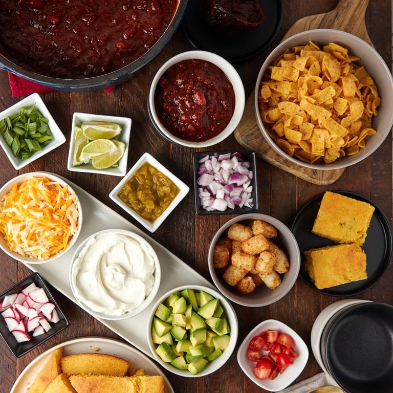 chili bar setup with all the toppings and side options.