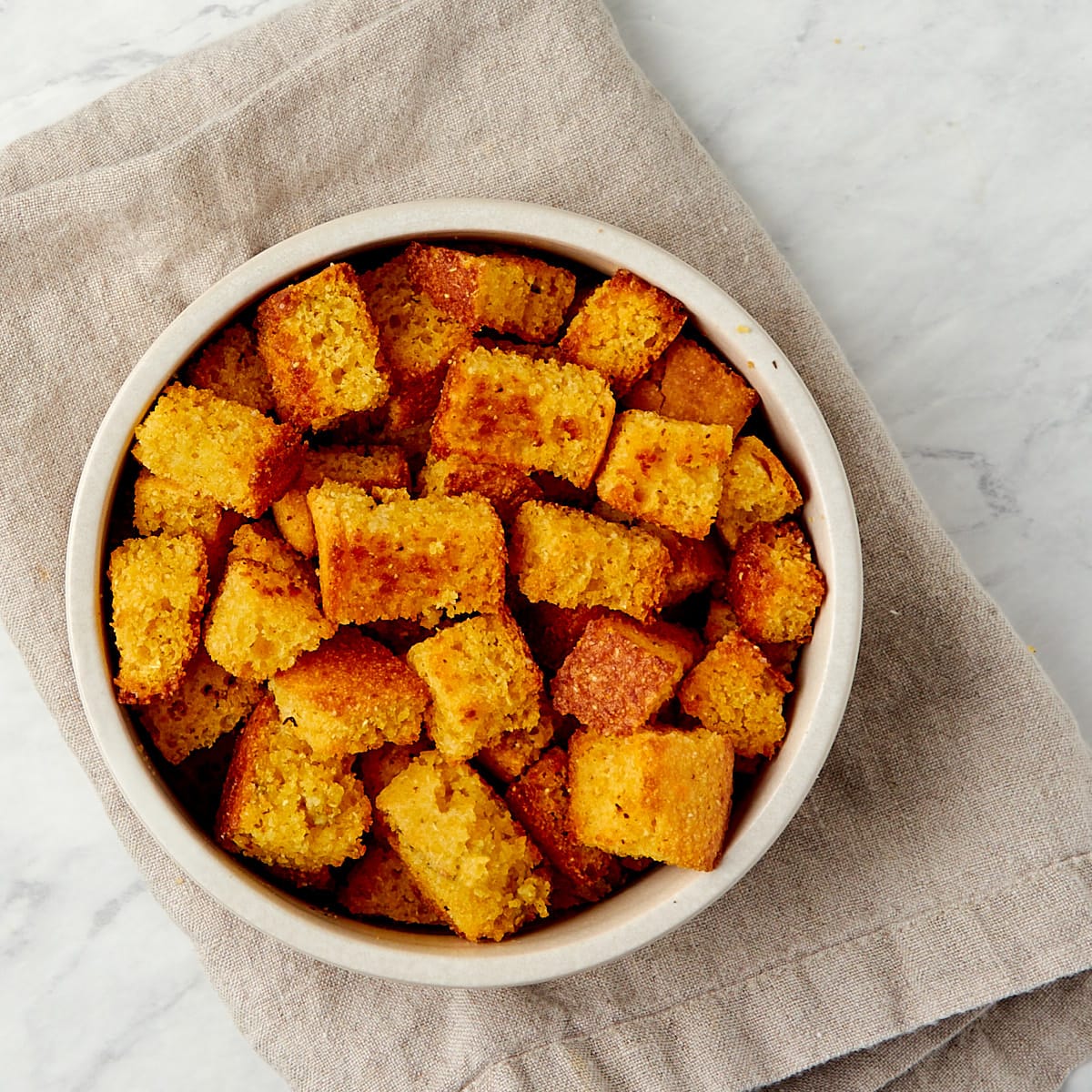 cornbread croutons in a bowl.