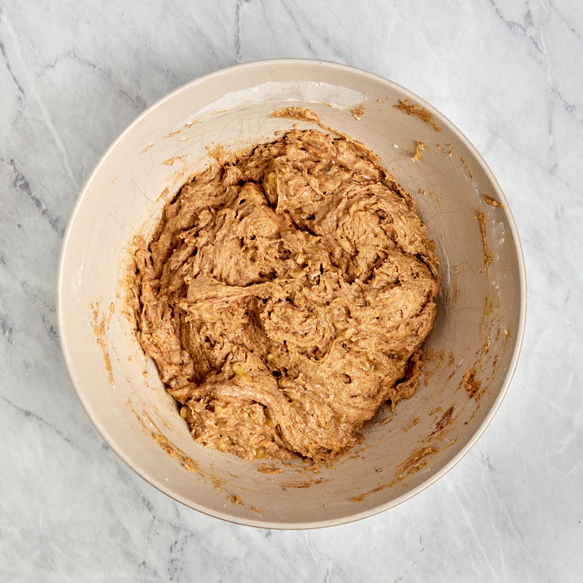 banana bread mixed in a bowl.