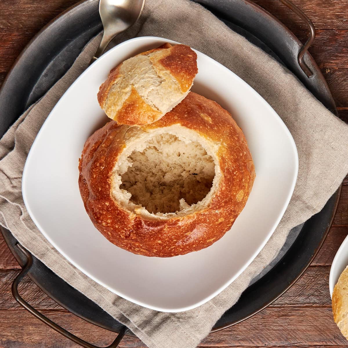 bread bowl that has been hollowed out.