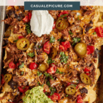 pinterest pin for pulled pork nachos.
