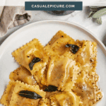 pinterest pin for ravioli in sage brown butter sauce.