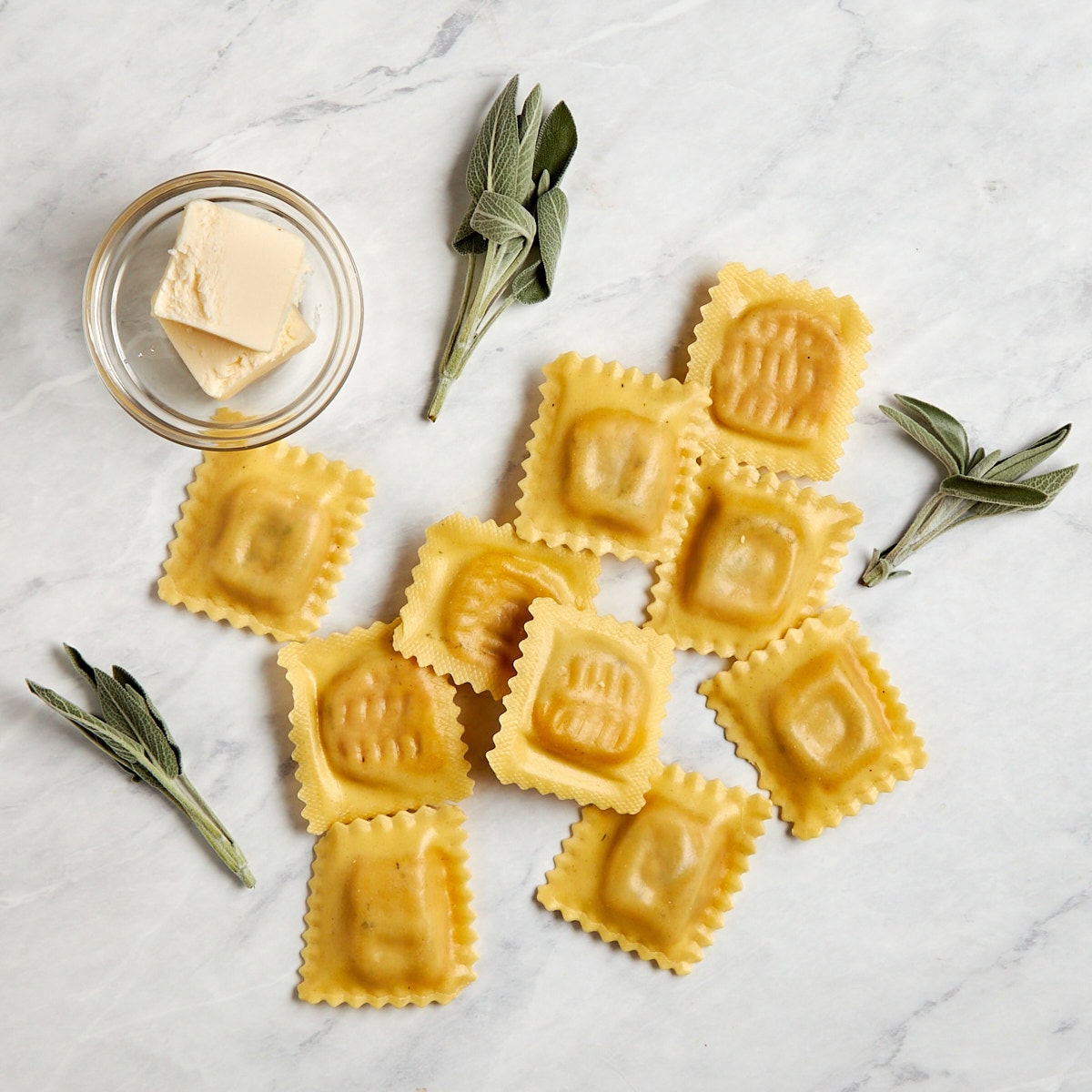 ingredients for ravioli in sage brown butter sauce.