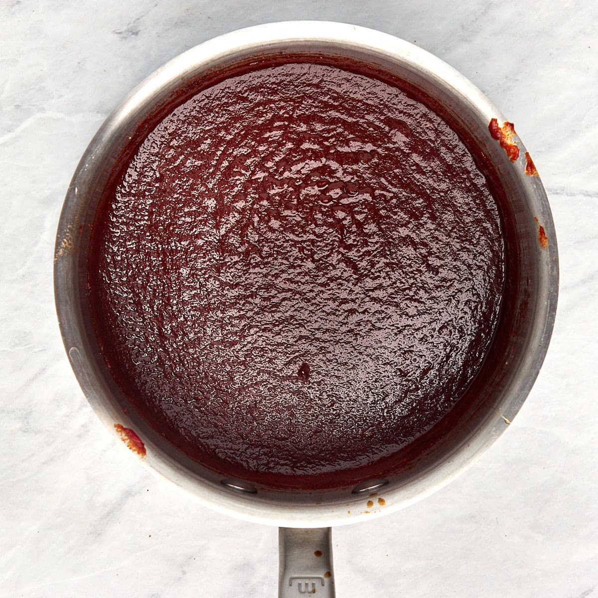 cooked bbq sauce in a saucepan.
