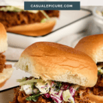 Delicious pulled pork sliders with coleslaw on soft buns, perfect for casual gatherings and comfort.