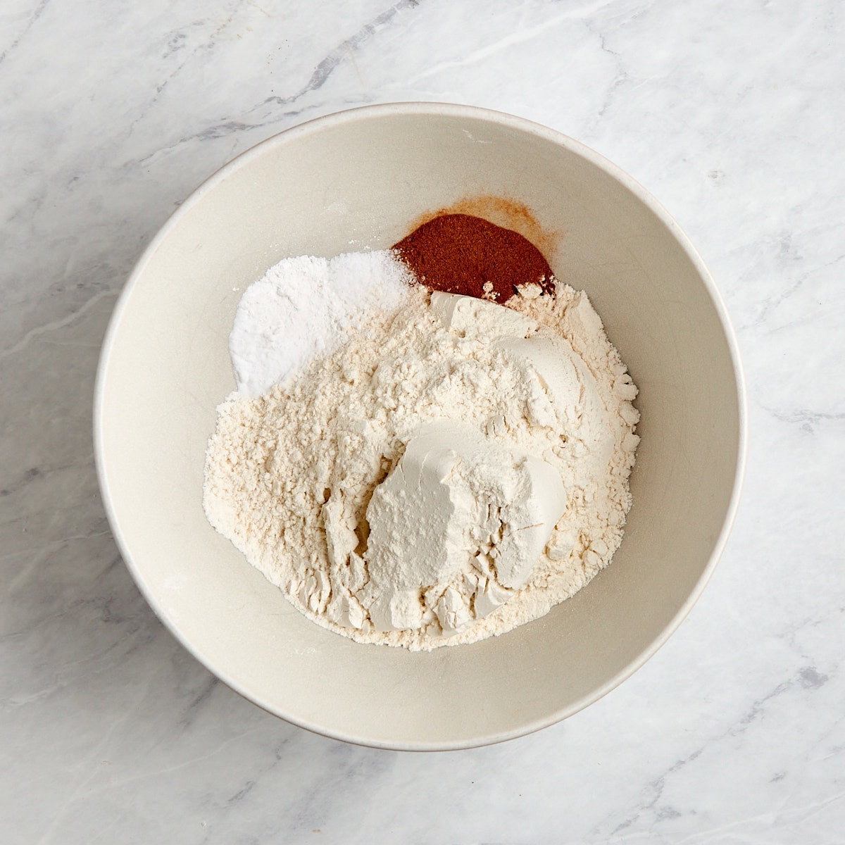 dry ingredients for muffins in a bowl.
