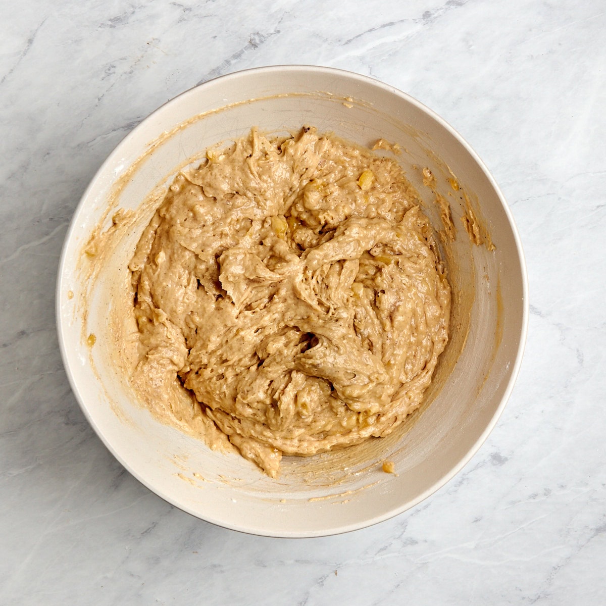 banana added to the wet and dry ingredients.