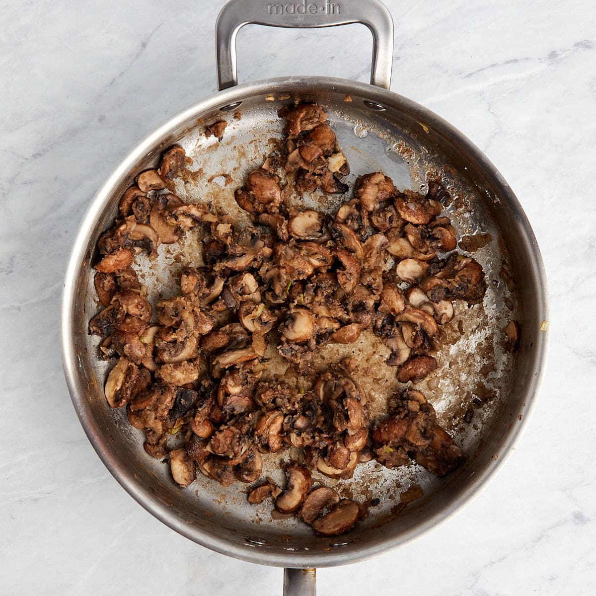 mushrooms in a large skillet with the butter flour mixture to make a roux.