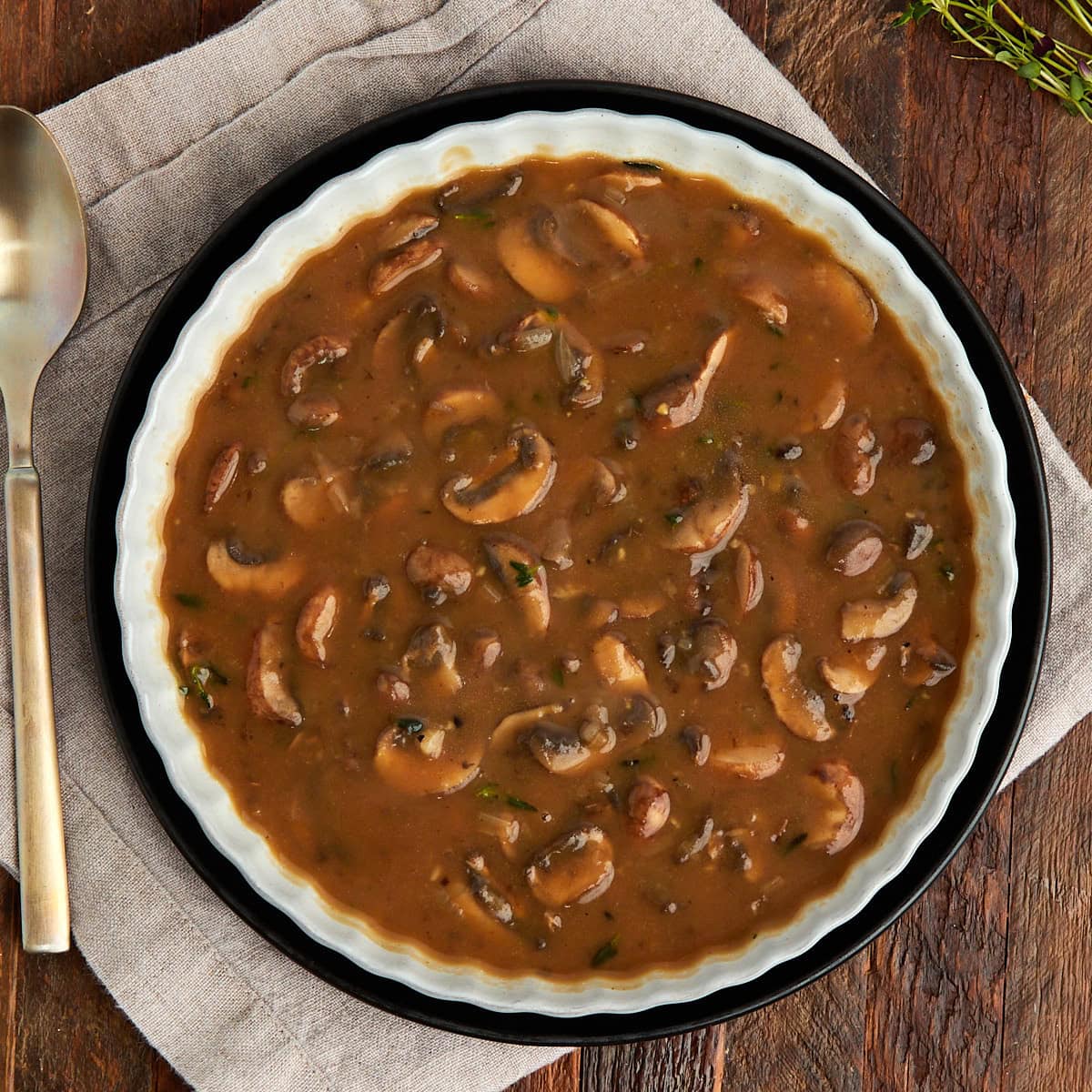 a bowl of mushroom onion gravy.