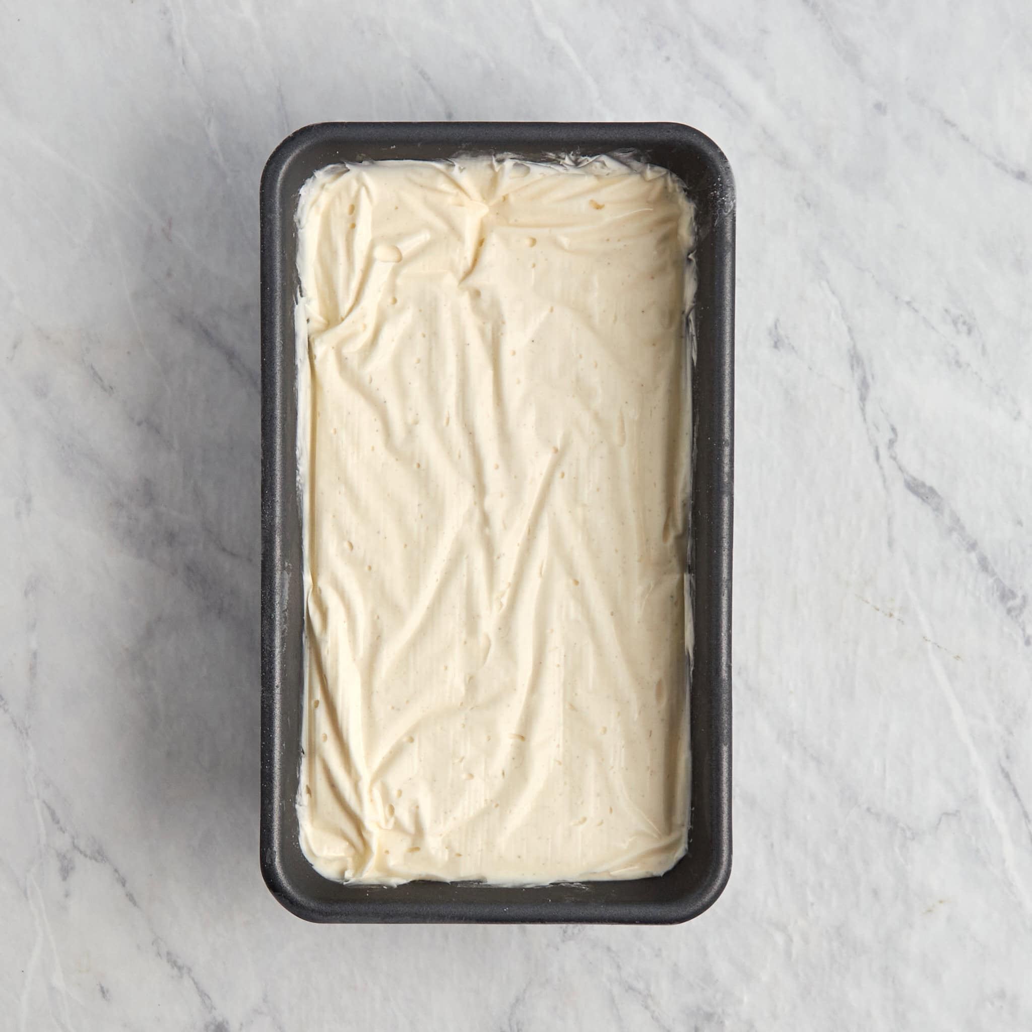 frozen vanilla ice cream in a loaf pan.