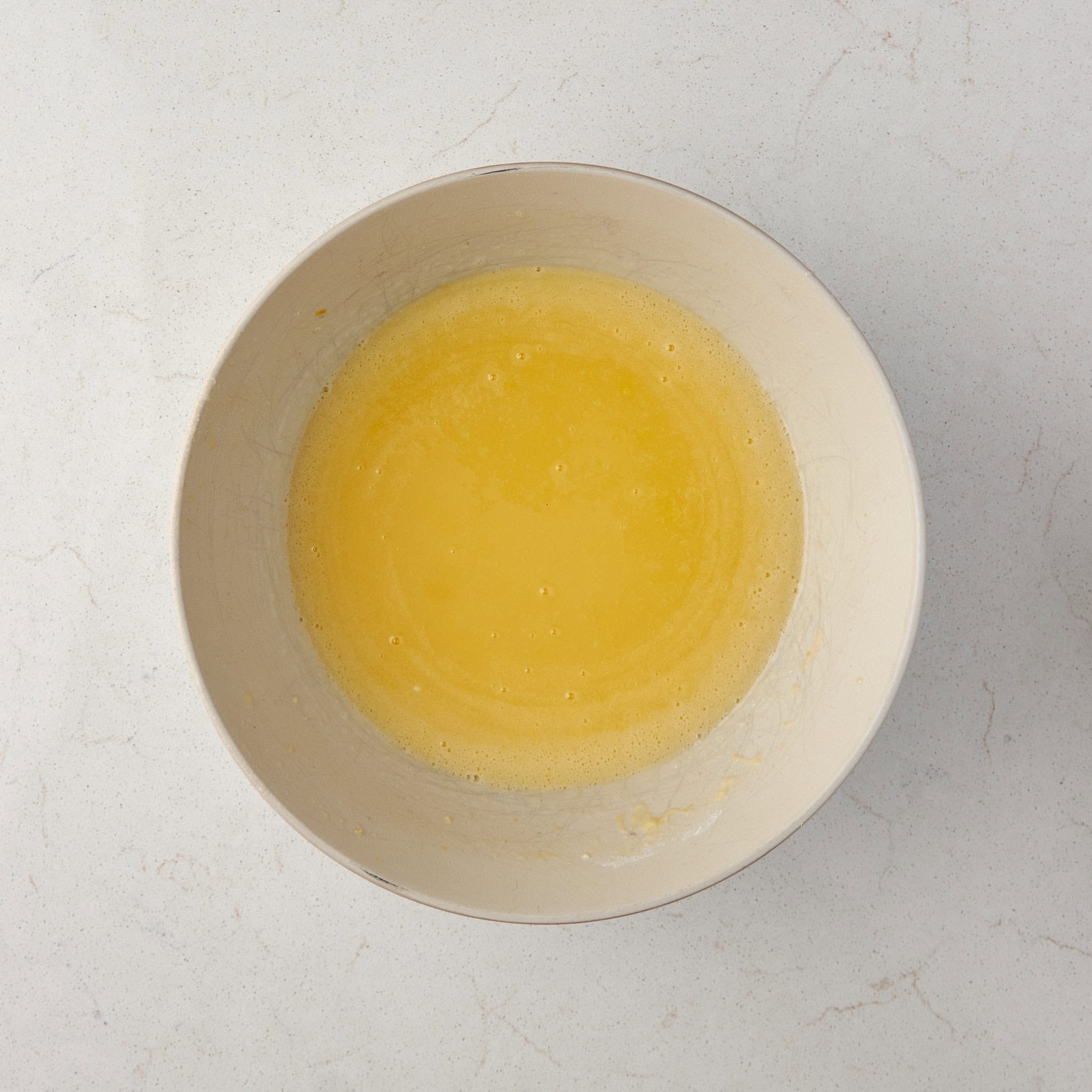 lemon bar topping mixture in a bowl.