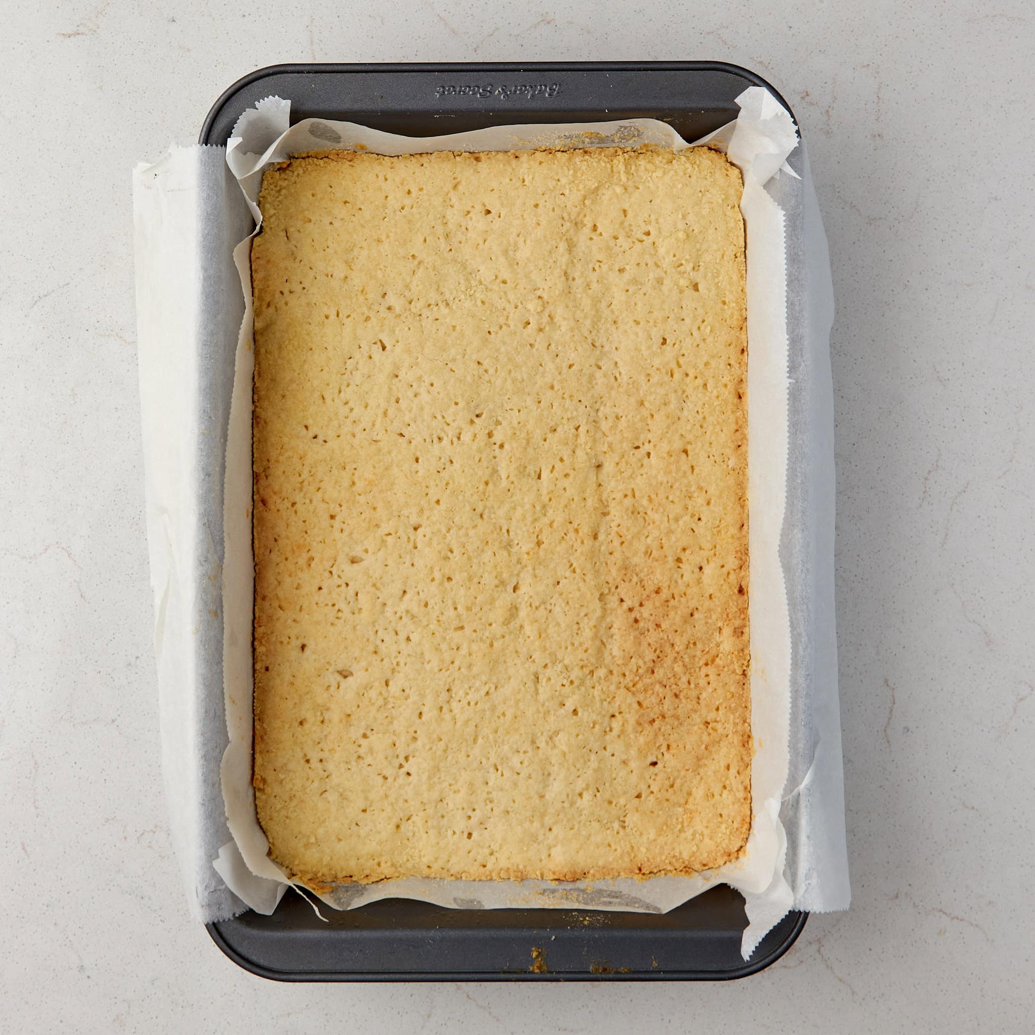 shortbread crust baked still in the pan.
