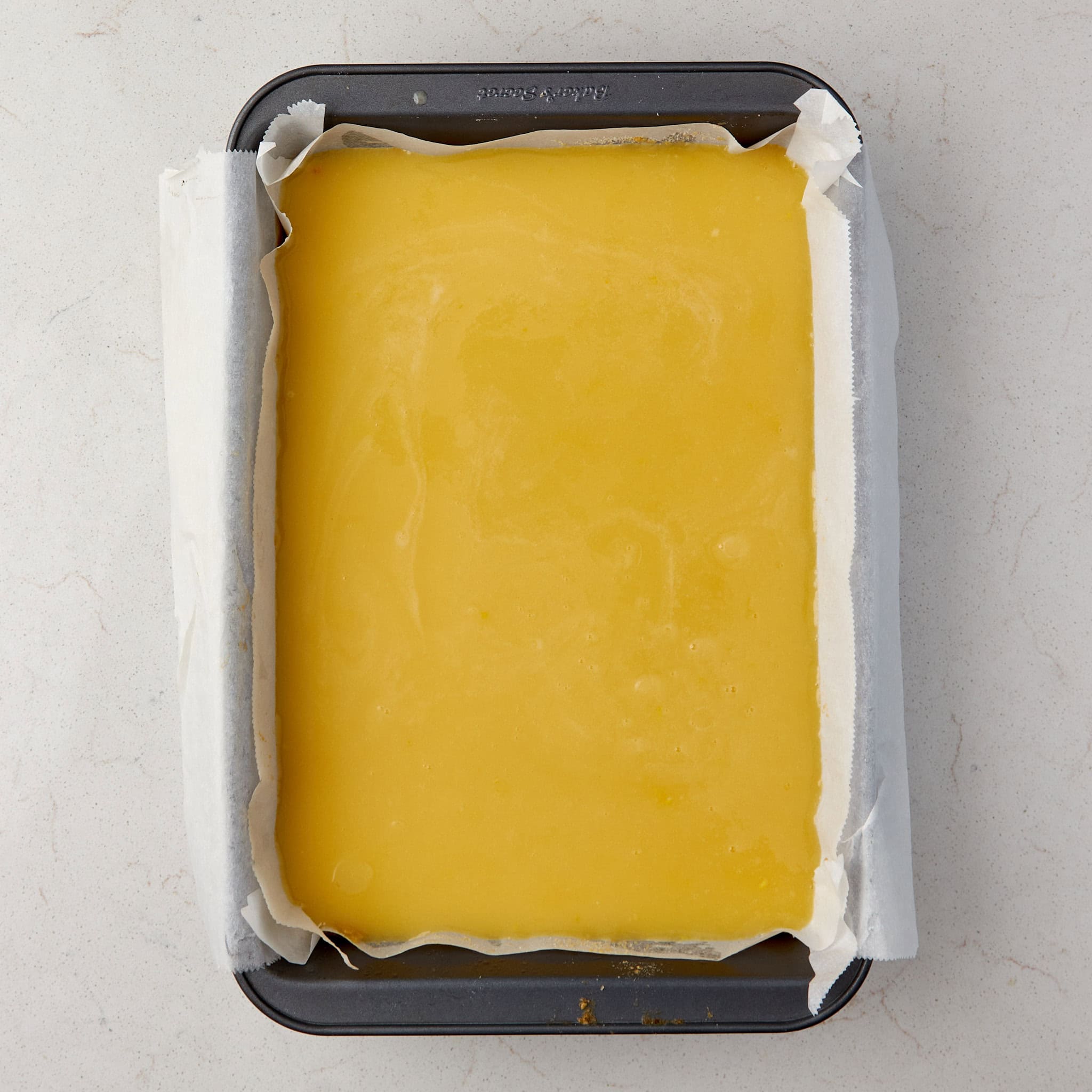unbaked lemon bars still in the pan.
