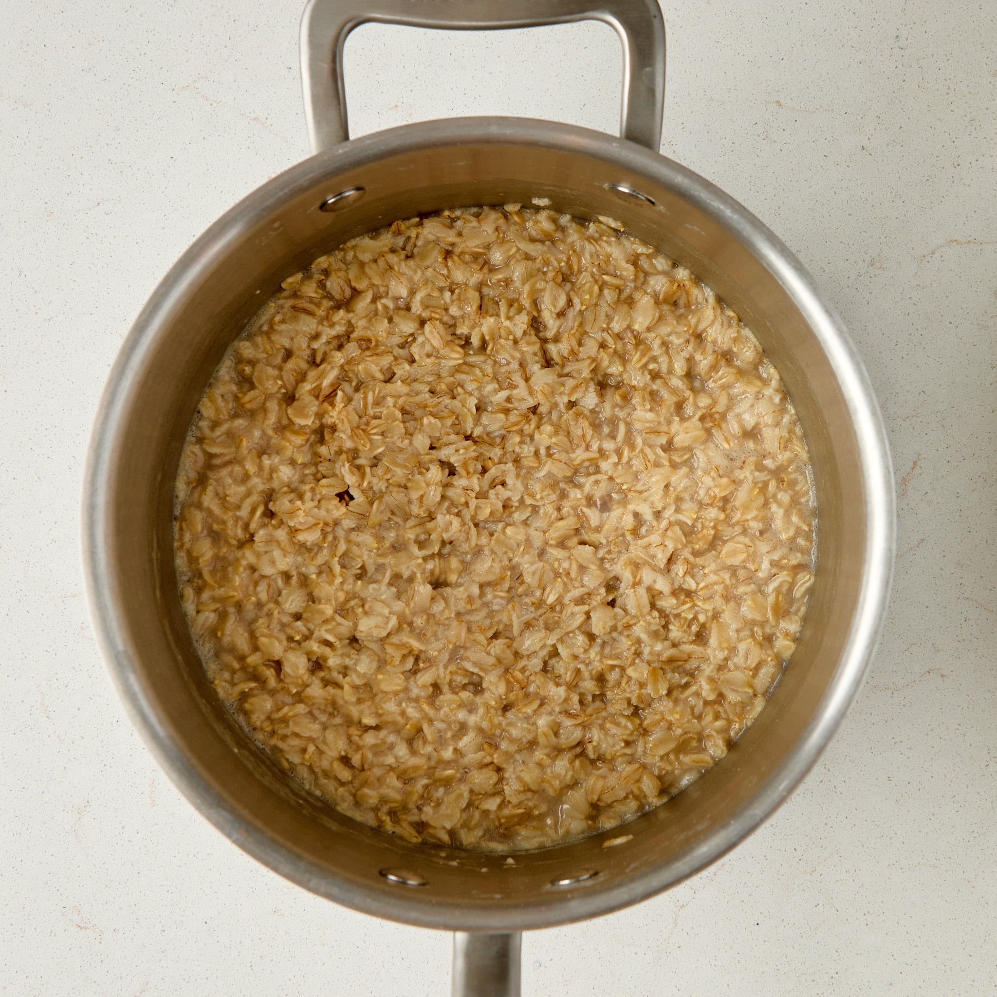 oatmeal cooking in a saucepan.