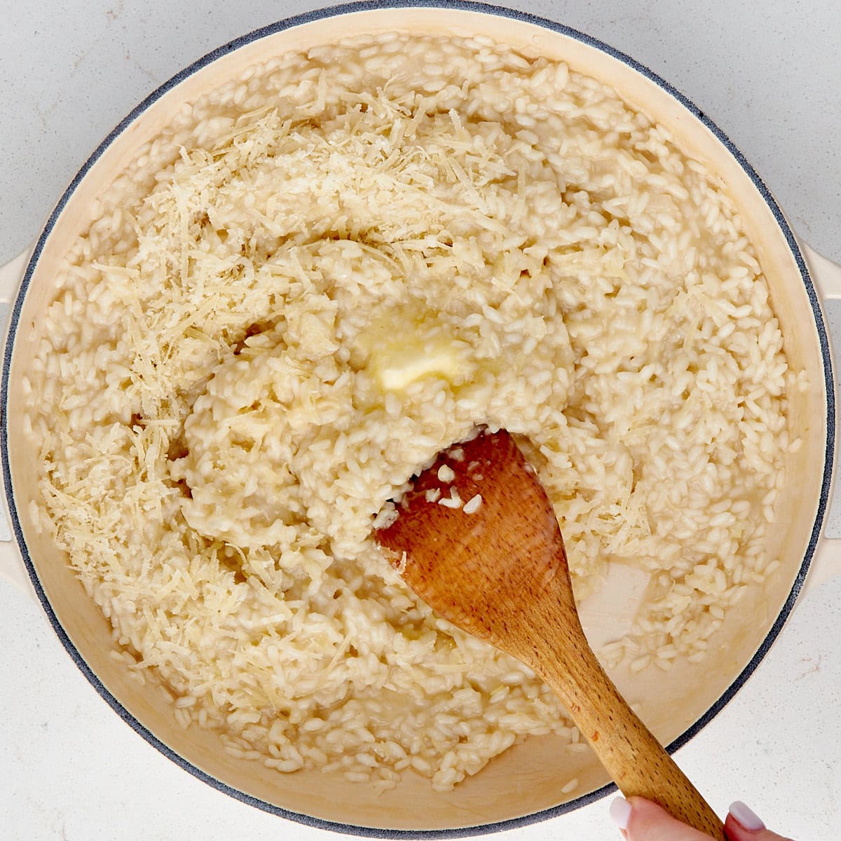butter and parmesan added to cooked risotto.