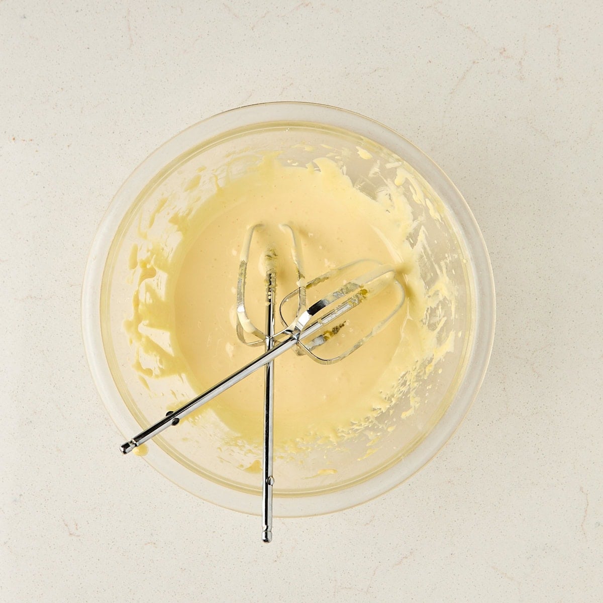 egg yolks and sugar whipped in a bowl.