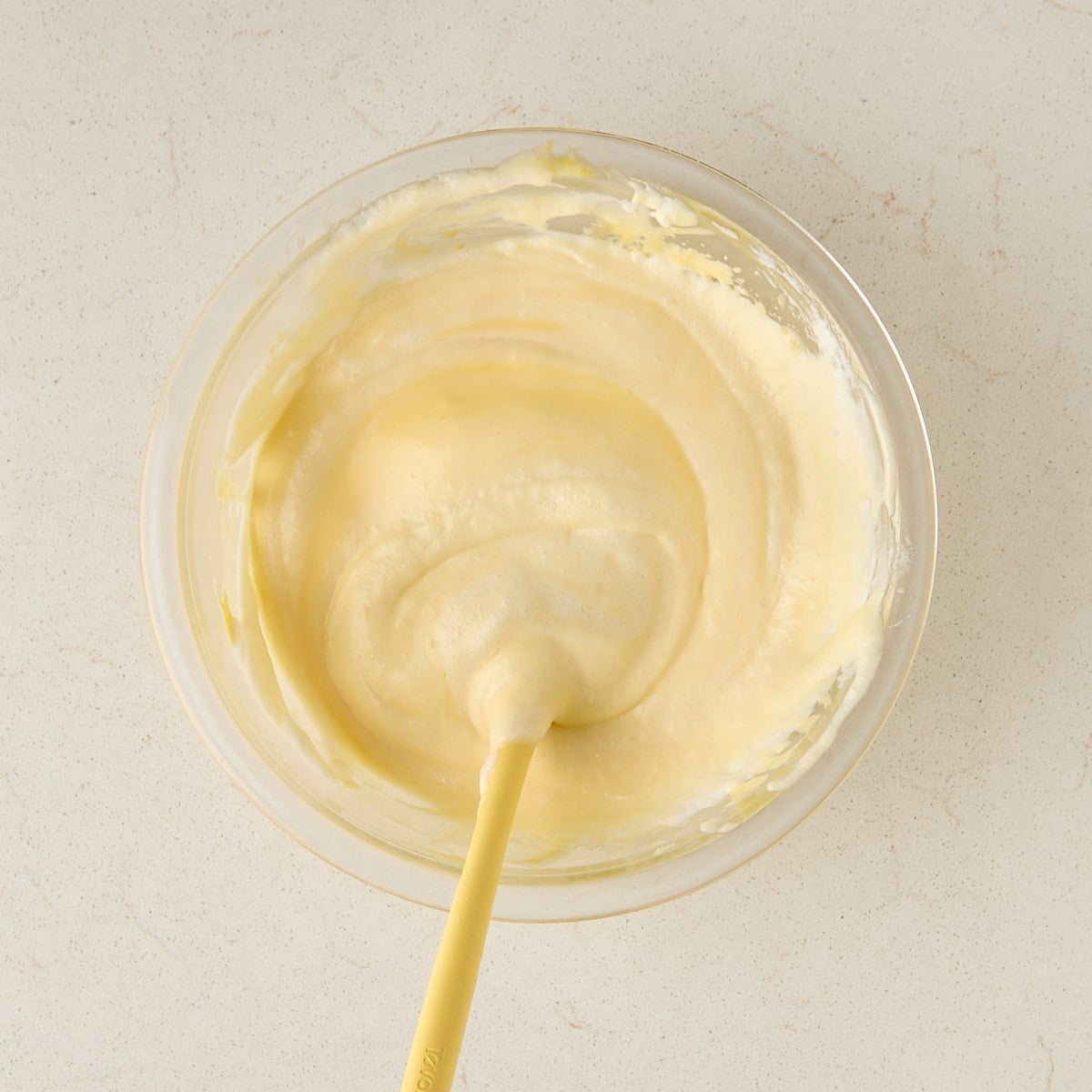whipped egg whites folded into yolk and mascarpone mixture.